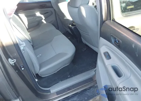 2015 Toyota Tacoma Base V6 z USA, uszkodzony, nr VIN 3TMLU4EN7FM167765